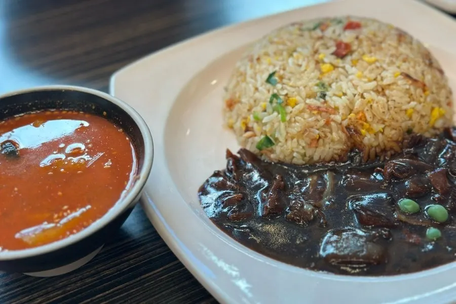 Table setting with jjamppong and crab fried rice together