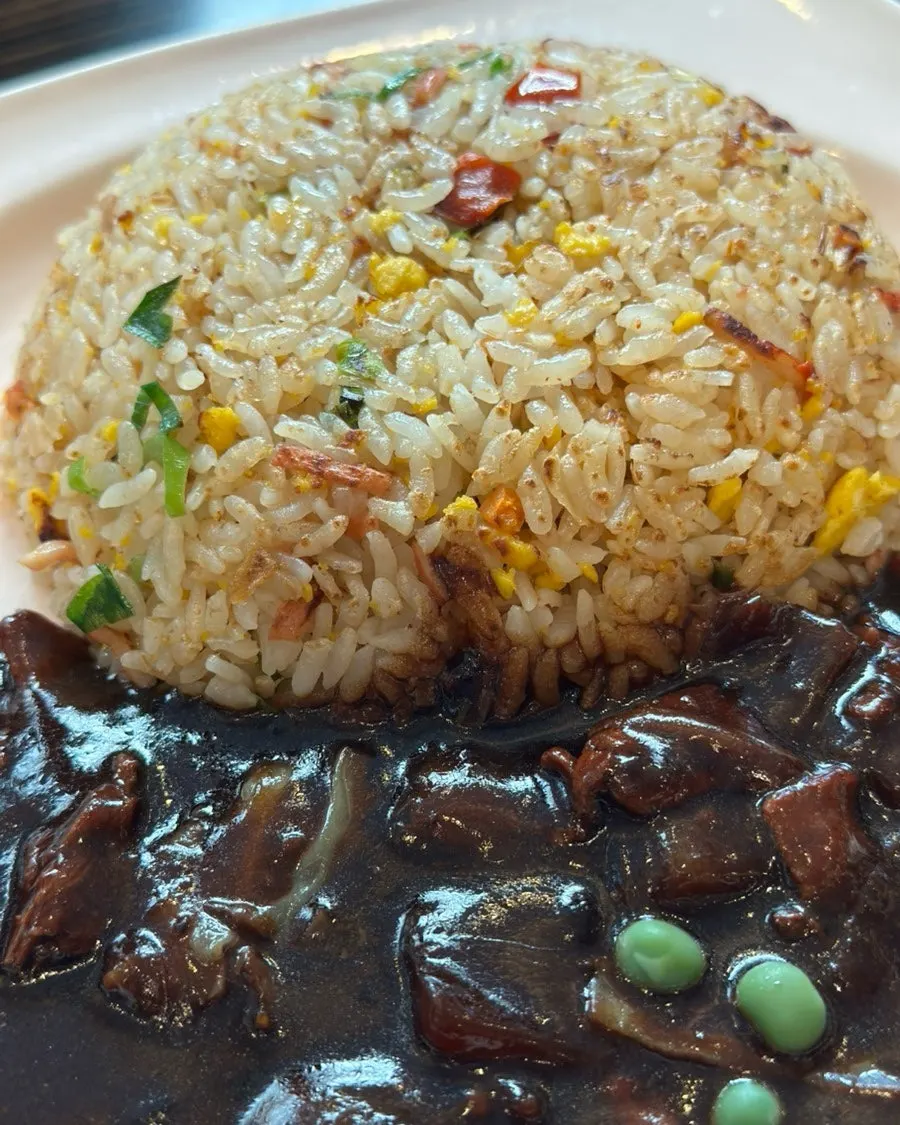 Crab fried rice served with jjajang sauce on the side