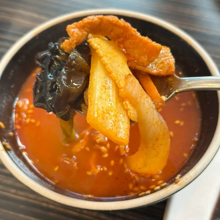 Jjamppong broth served alongside the fried rice