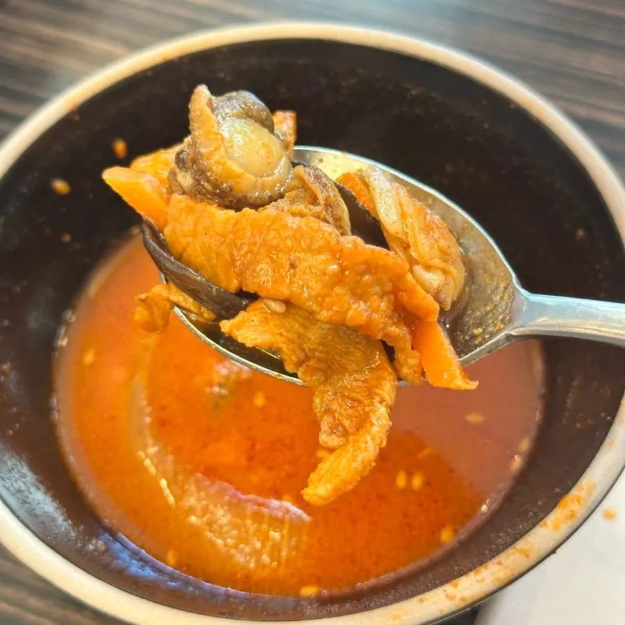 Jjamppong broth loaded with toppings