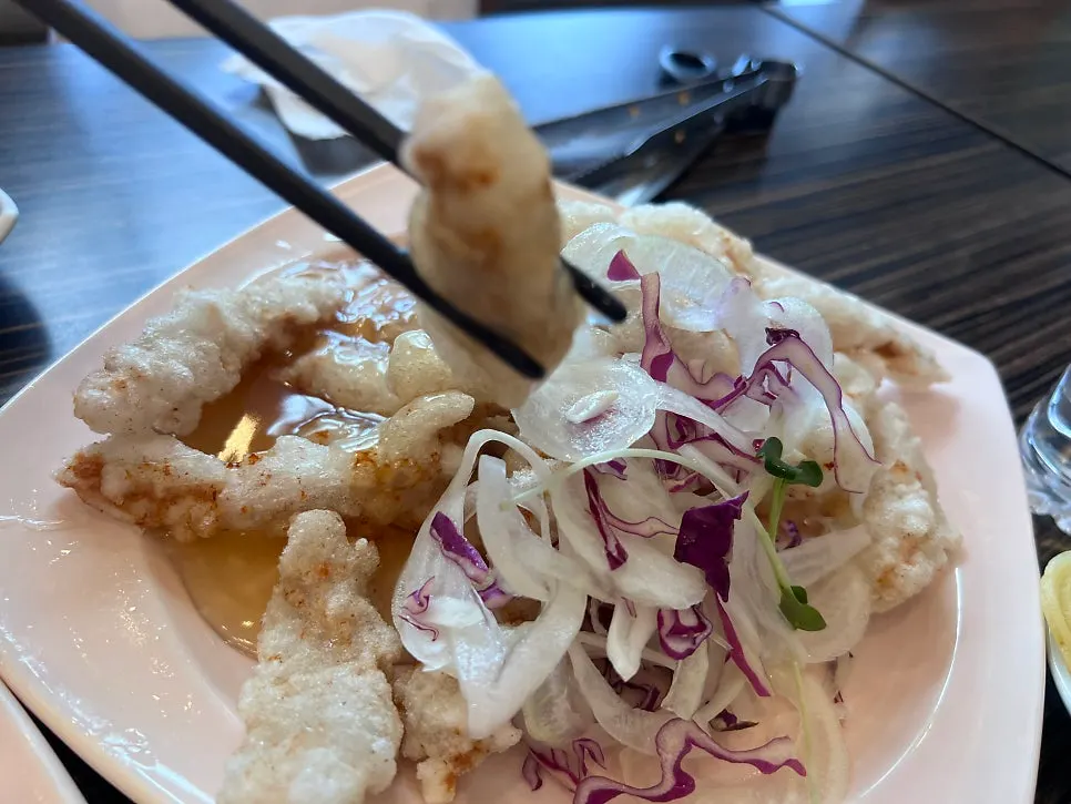 A plate of crispy fried menbosha