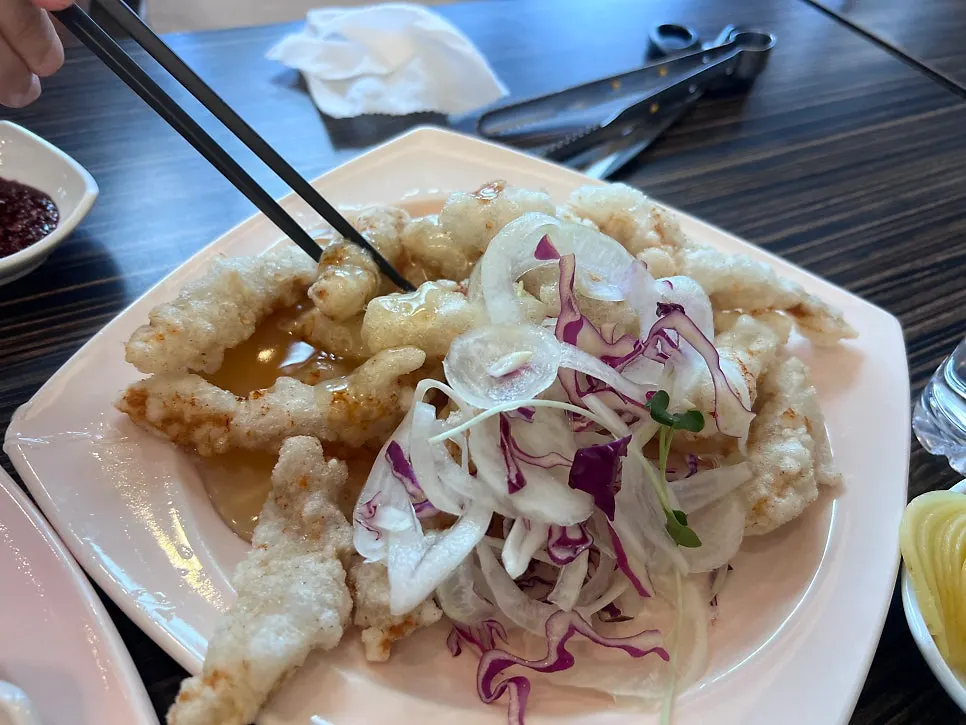 A cross-section of menbosha showing the shrimp filling