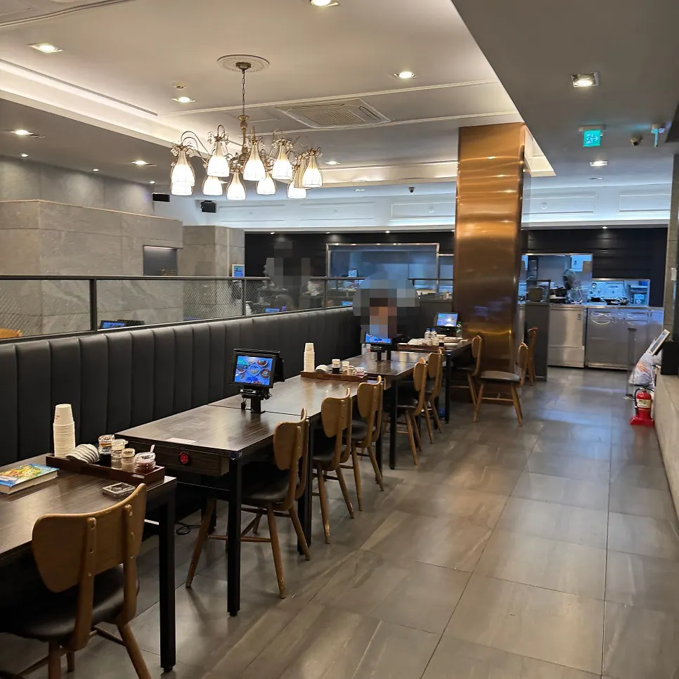 Spacious, clean interior of the Chinese restaurant hall