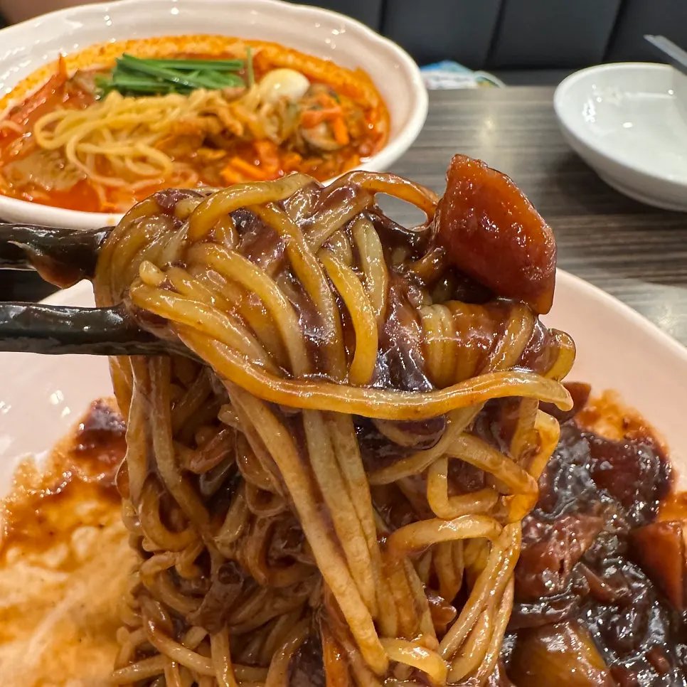 Jjajangmyeon topped generously with sauce