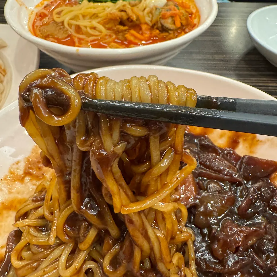 Close-up of jjajangmyeon ready to mix