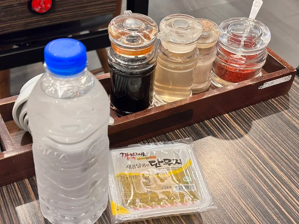Basic table setting with soy sauce, vinegar, pepper and chili powder