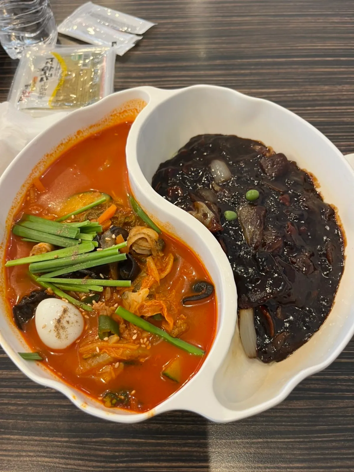 Side plate with kimchi, jjasai, and a bowl of rice