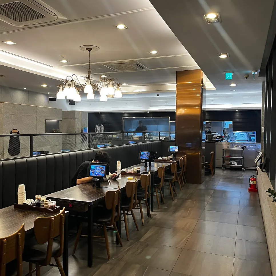 Restaurant entrance with an outdoor waiting area
