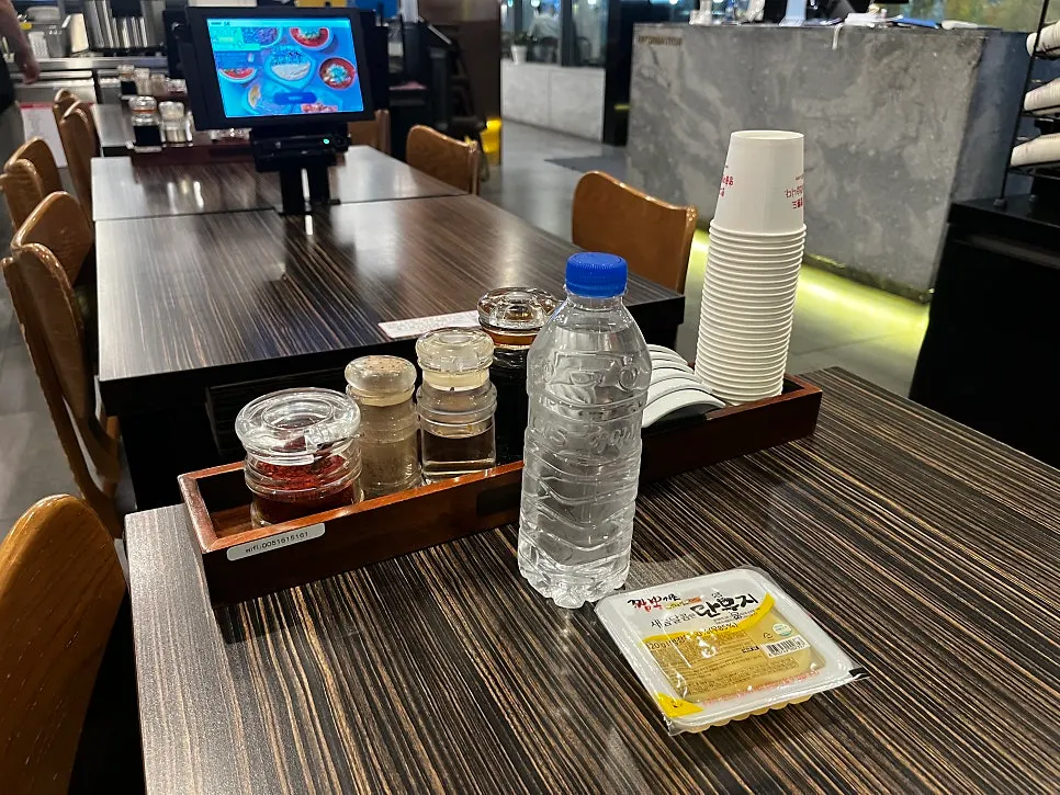 Self-serve bar corner with baby spoons and even hair ties