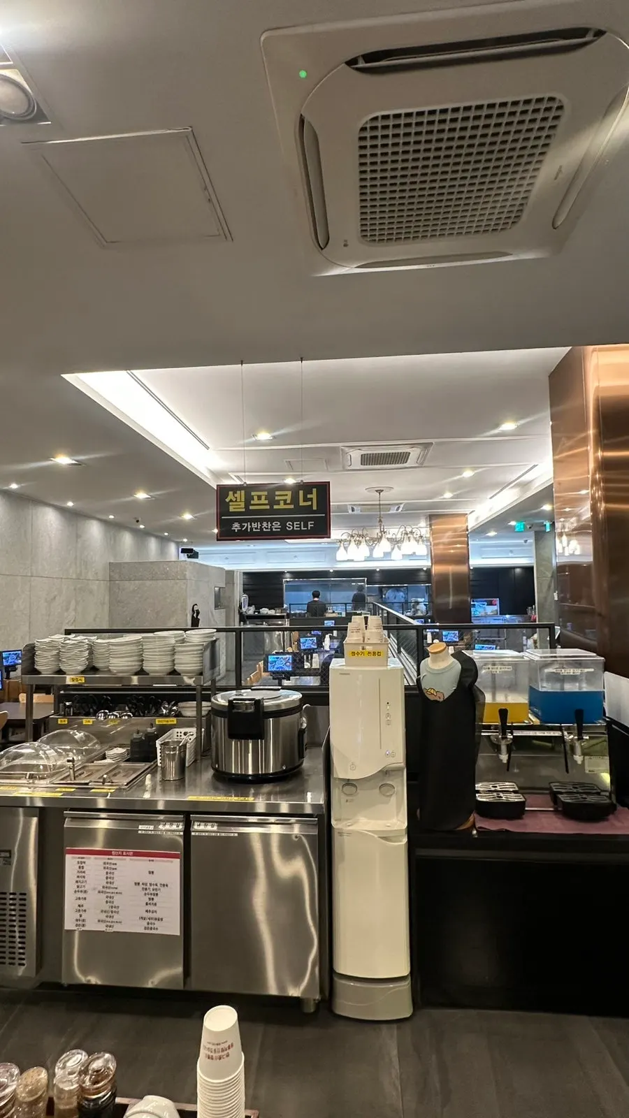 Self-serve bar with side dishes and tableware