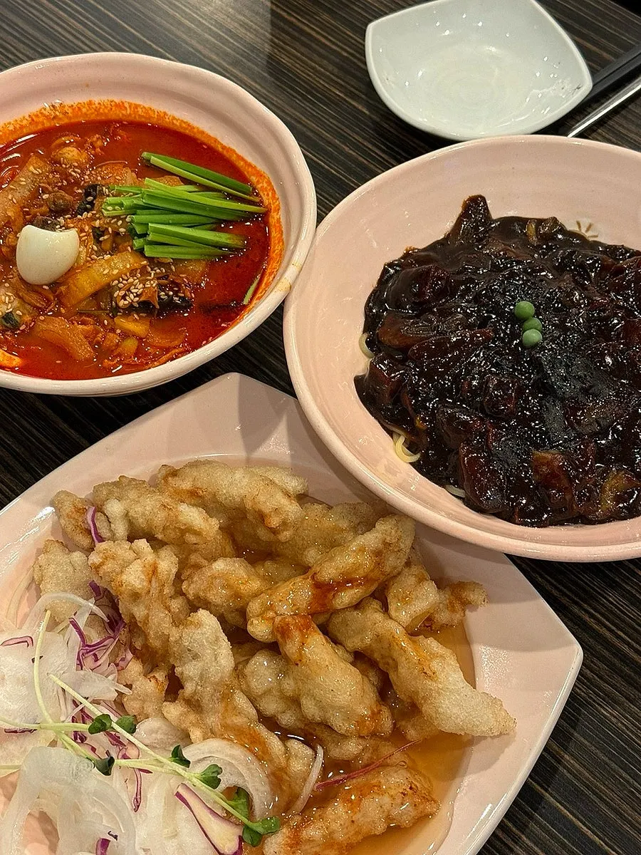 Jjamppong, jjajangmyeon, and sweet and sour pork served together