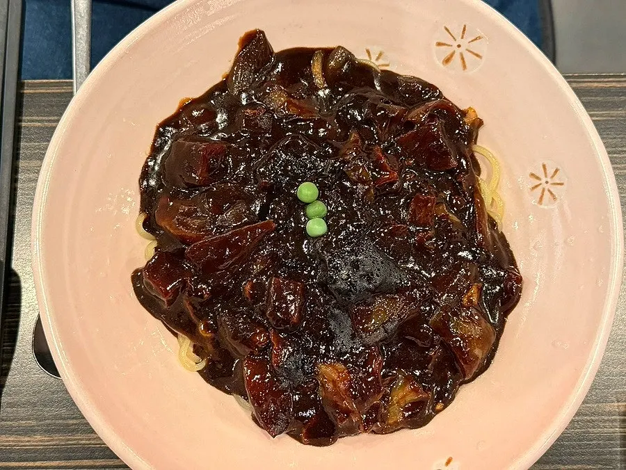 A bowl of jjajangmyeon before mixing