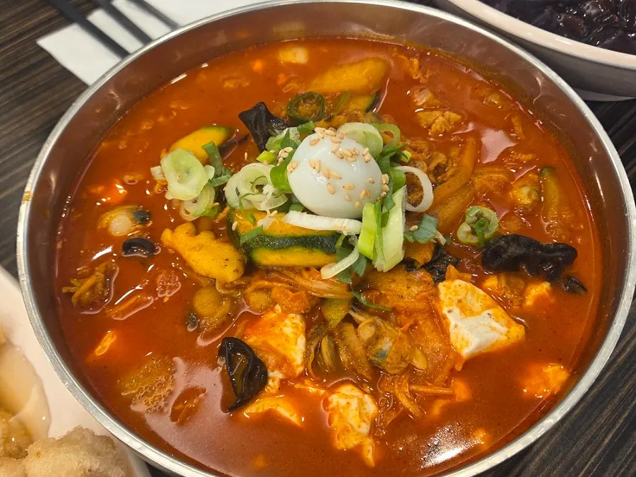 Jjajangmyeon served with side dishes