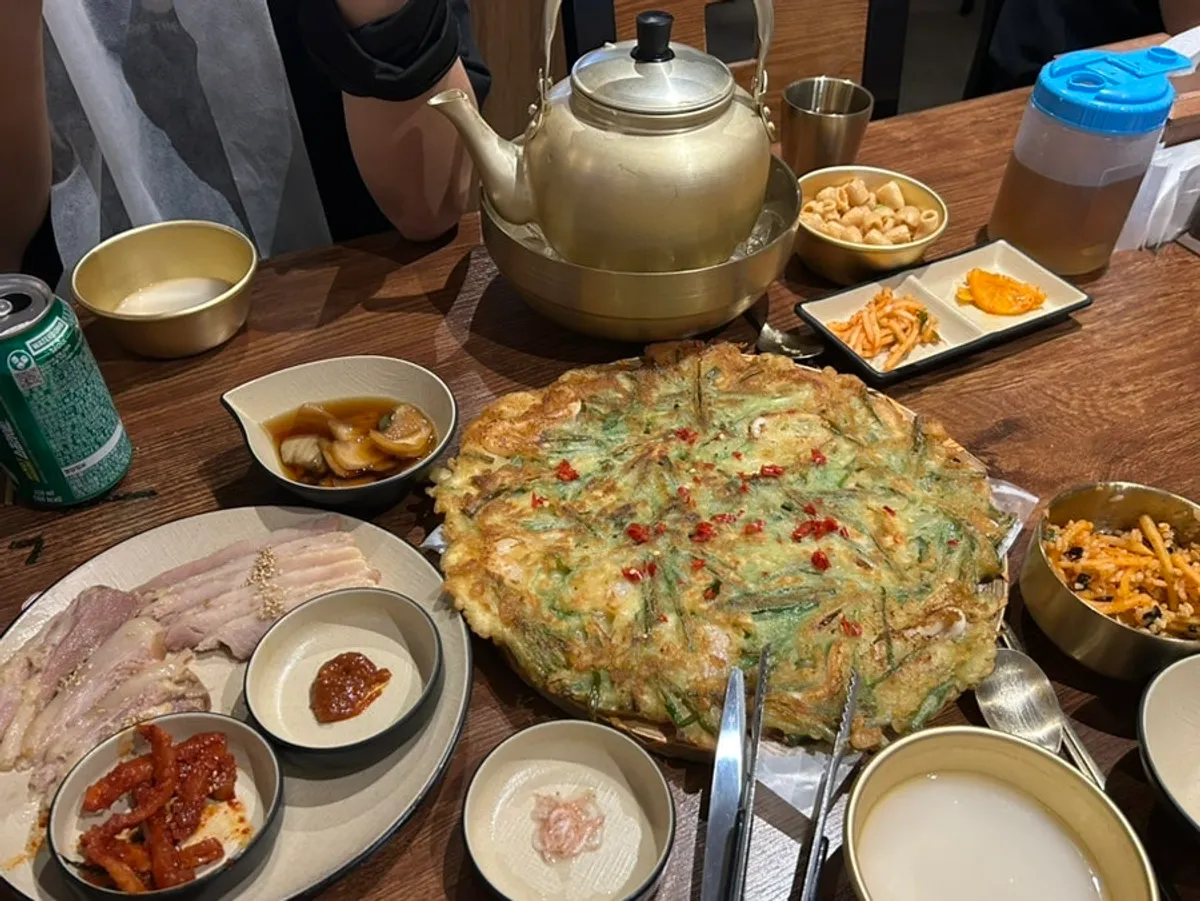 A large seafood pancake served whole