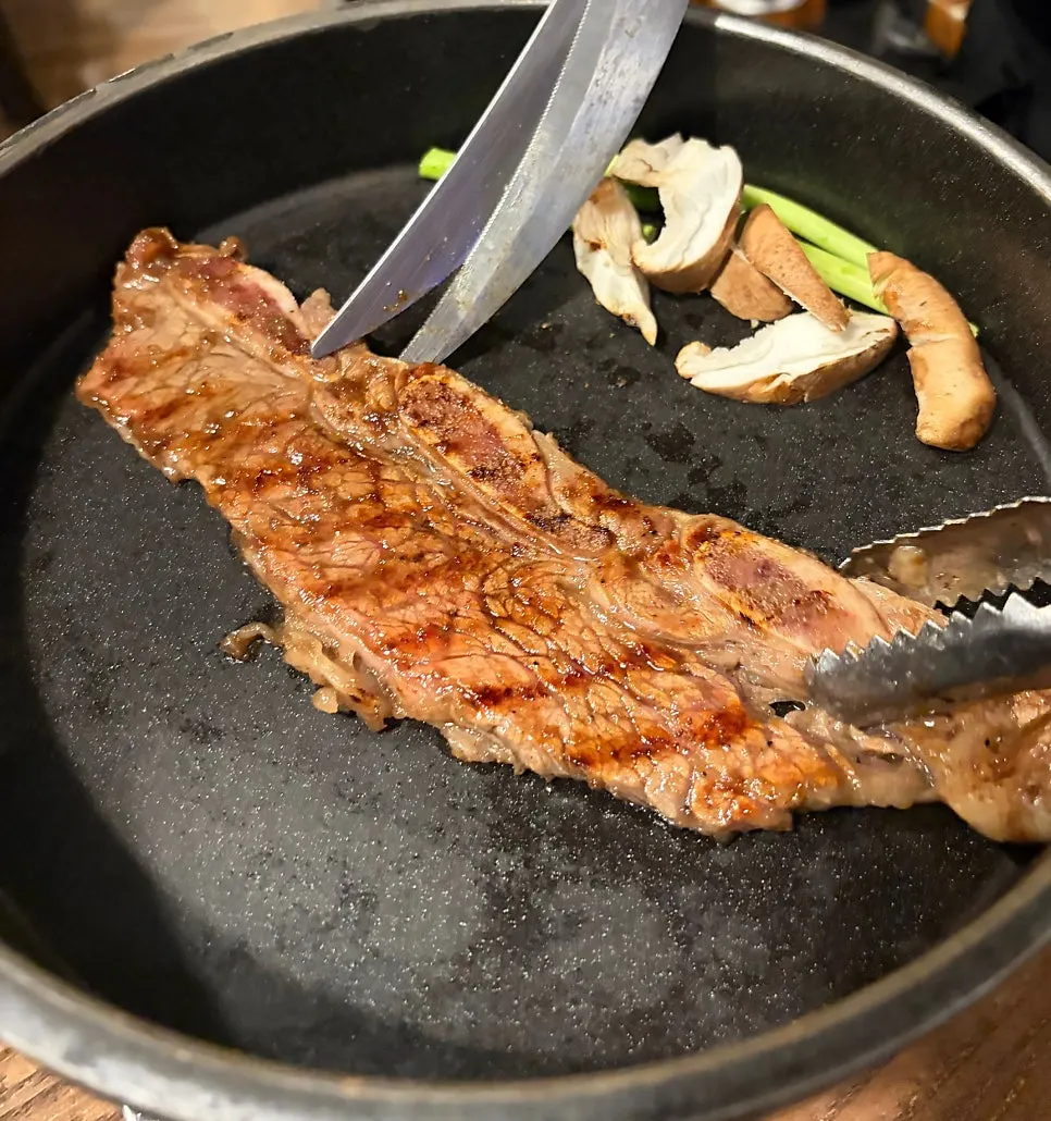 LA galbi grilled by a staff member