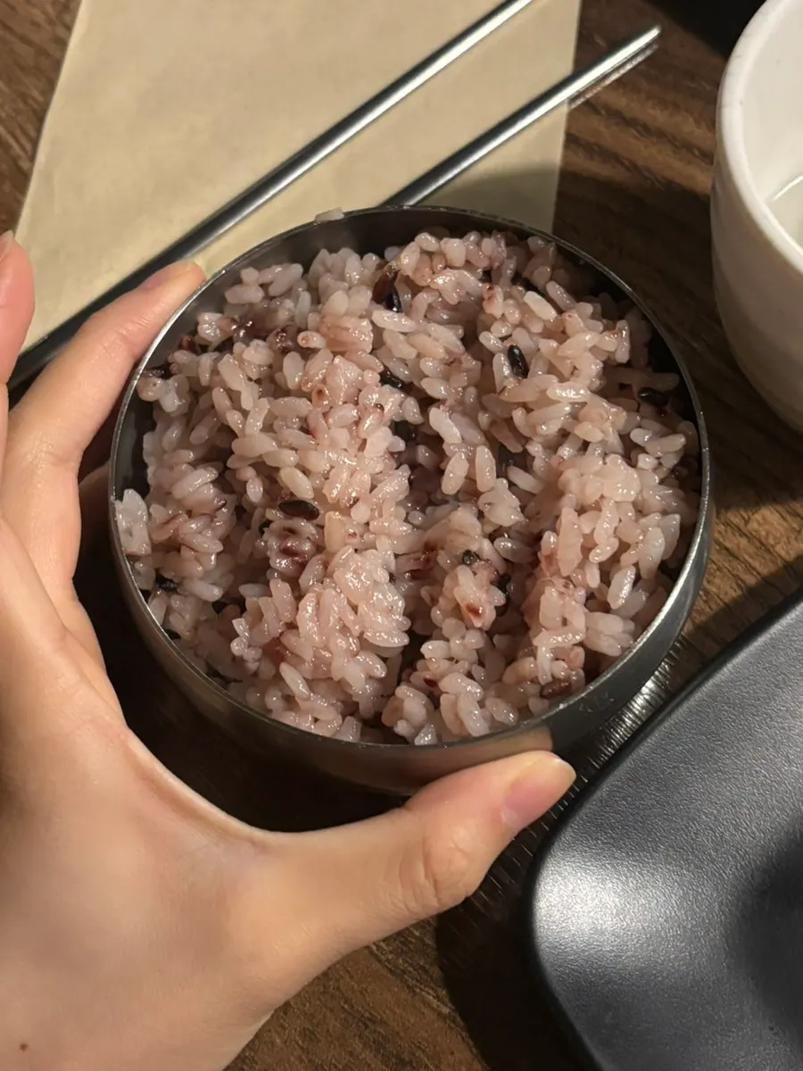 Black rice served with the meat