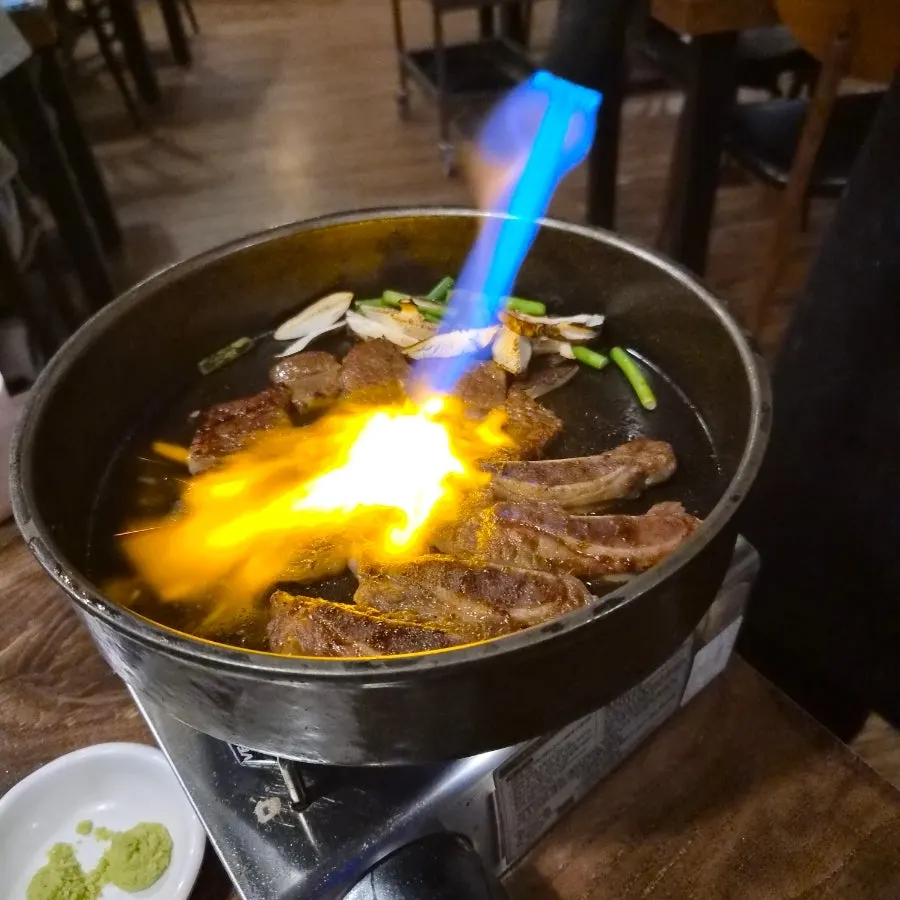 Marinated ribs in a fire show