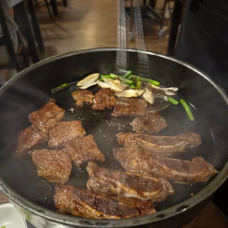Ravi marinated ribs cooking