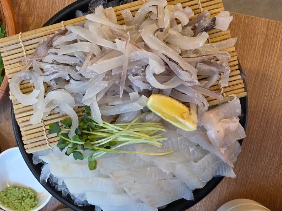 Halibut sashimi and squid sashimi on one plate