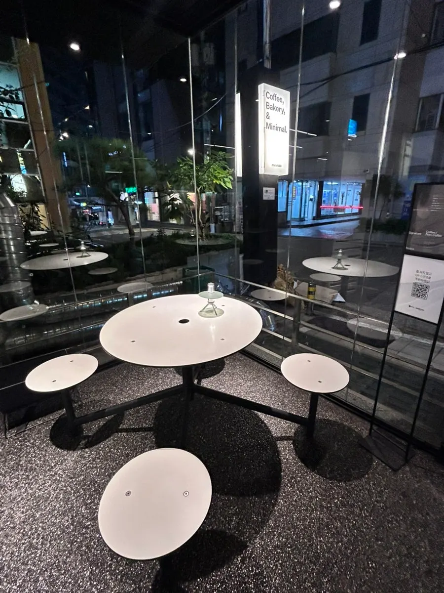 Café interior with full-height windows