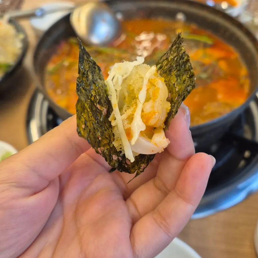 Flying fish roe cuttlefish sashimi wrapped in seaweed