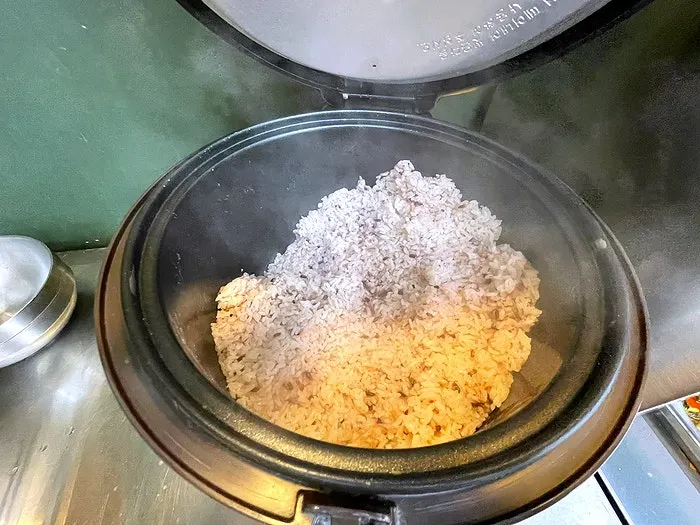 Unlimited rice refill pot at the self-serve corner