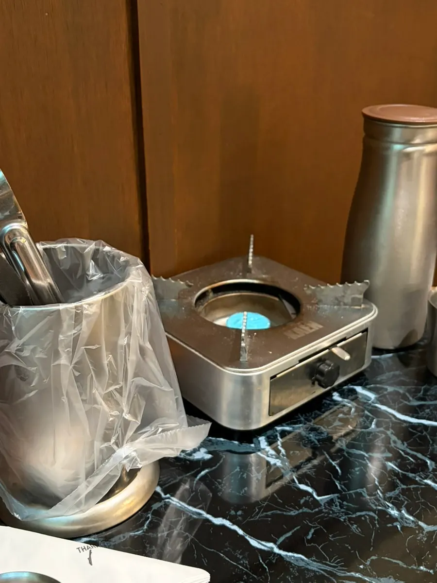 Yeongchun Galbi's basic table setting with a mini brazier