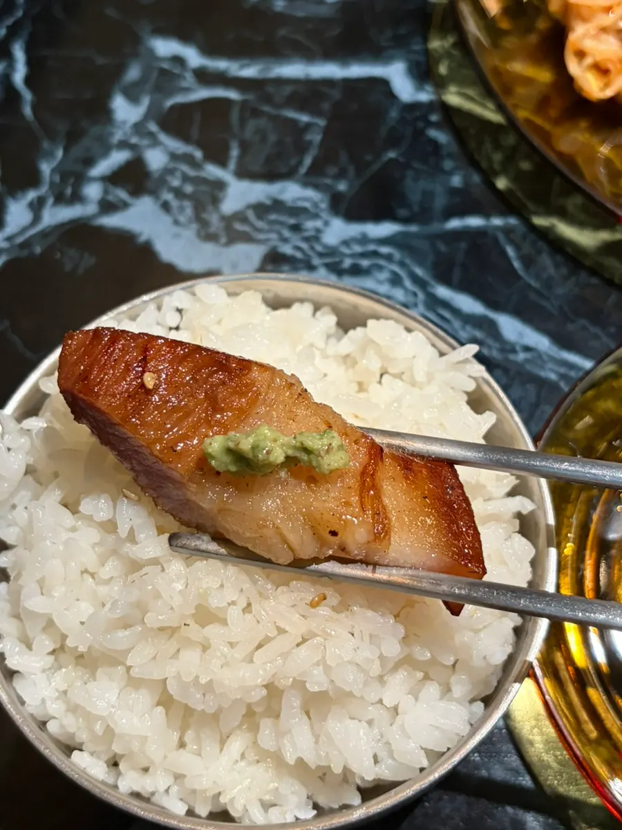 Black pork seasoned BBQ topped with gochu pesto, served with rice