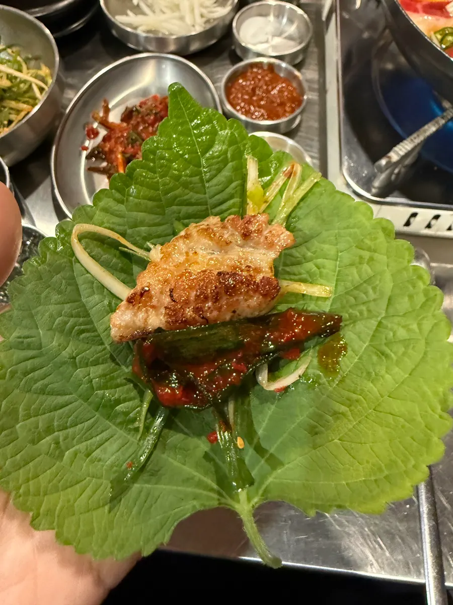 Perilla-leaf wrap with meat and green-onion kimchi