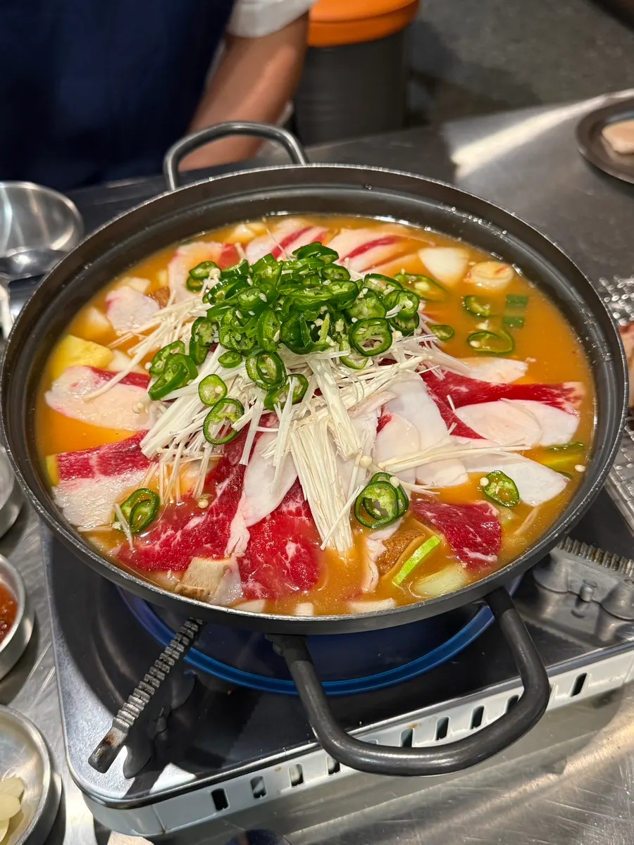 Brisket doenjang sulbap topped with beef and vegetables