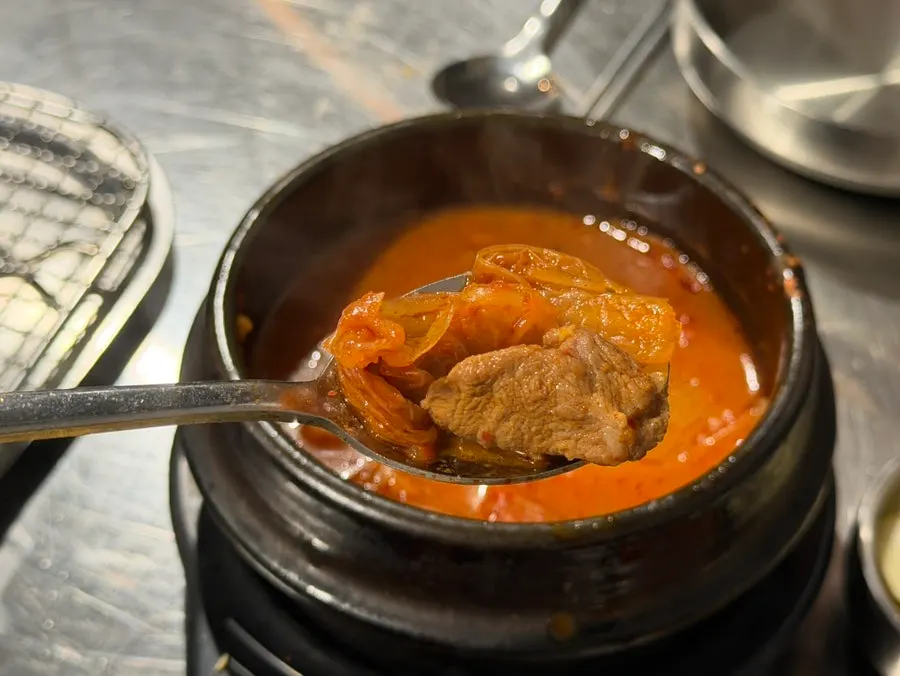 Kimchi stew and rice table setting