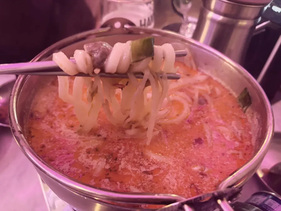 Udon noodles coated in cream sauce