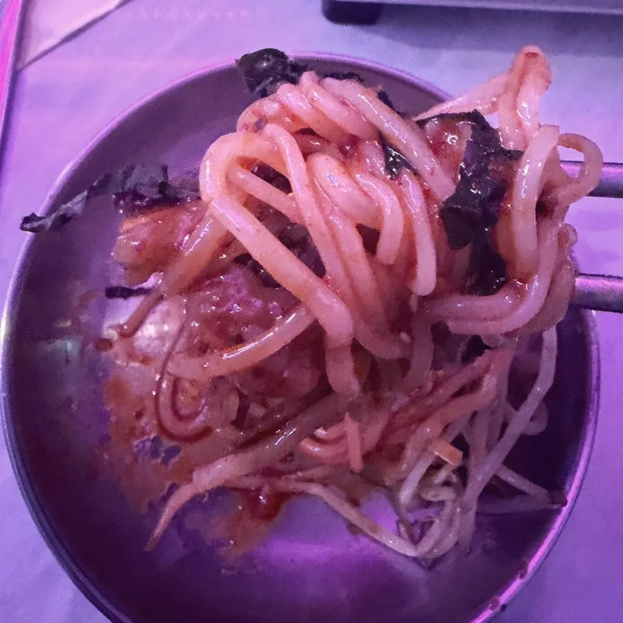 A plate of spicy bibim noodles
