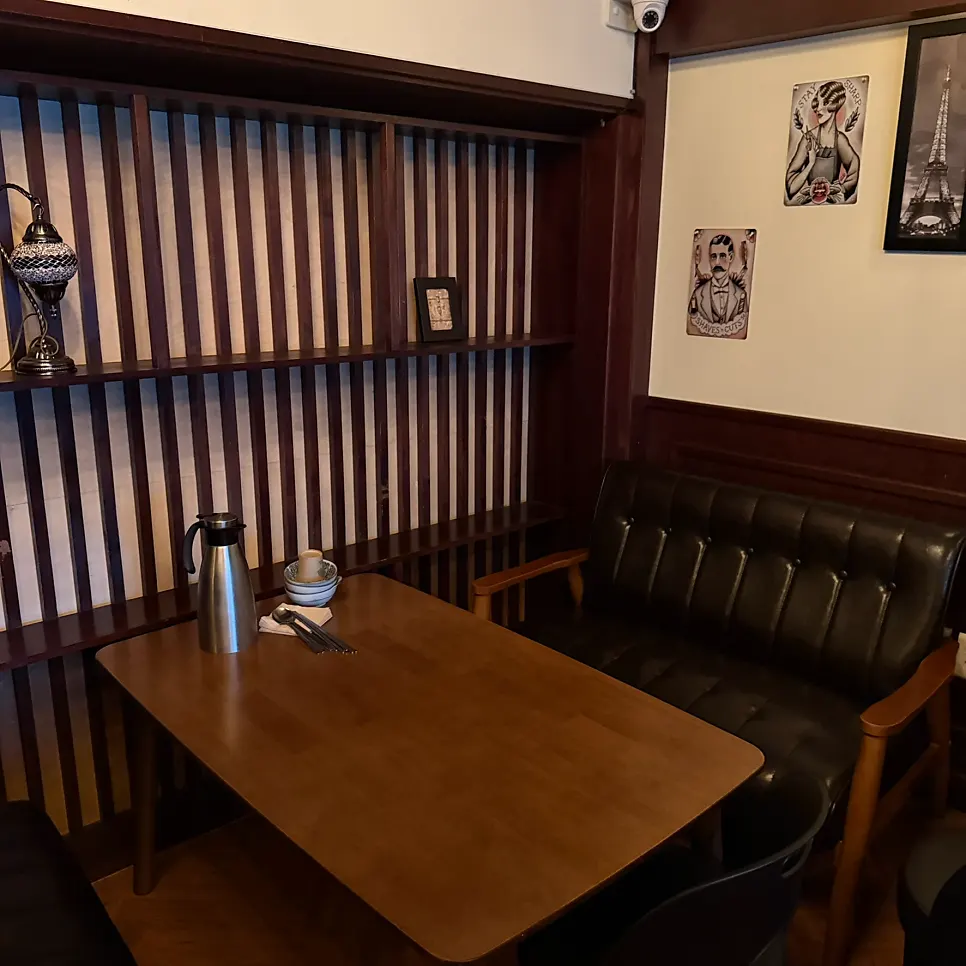 Softly lit izakaya hall seating