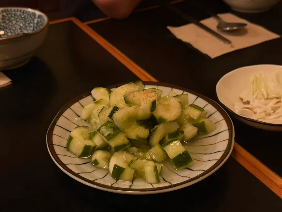 A plate of tangy-sweet izakaya cucumber muchim