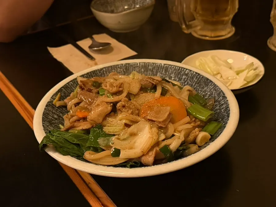 Pork belly yaki udon with sliced pork belly and vegetables