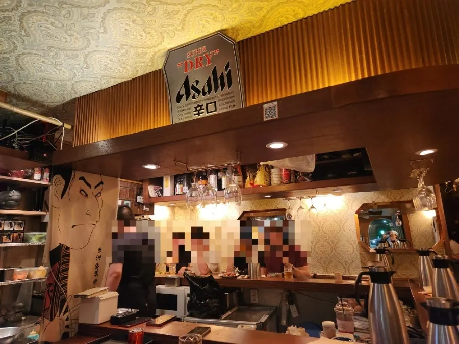 Sleek izakaya interior and bar seating