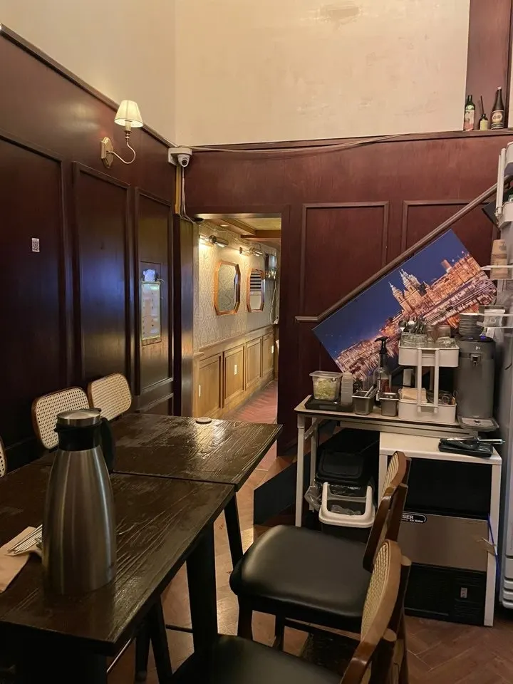 Cozy izakaya interior with warm lighting turned on