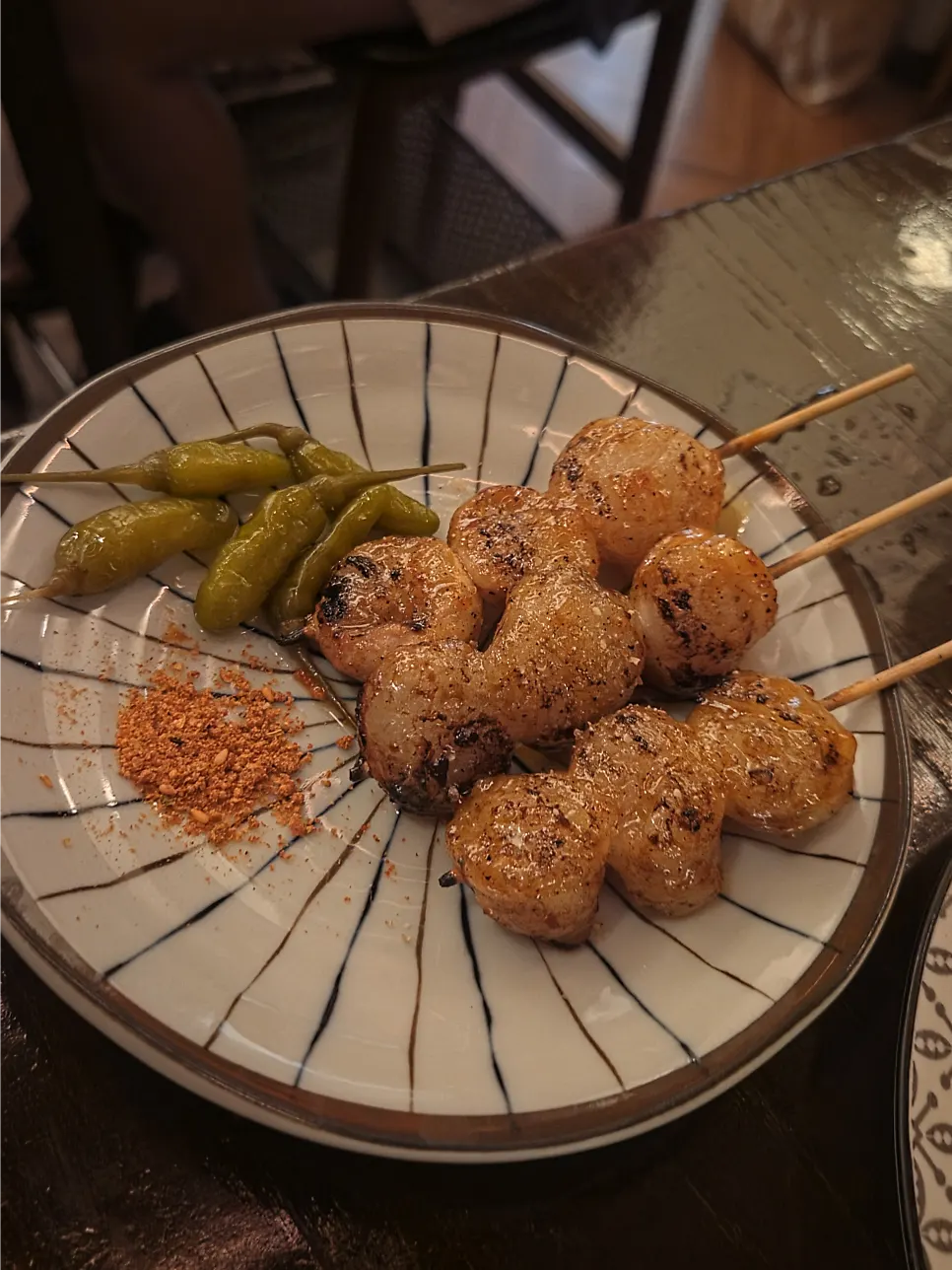 Five chicken skewers served with mayo sauce