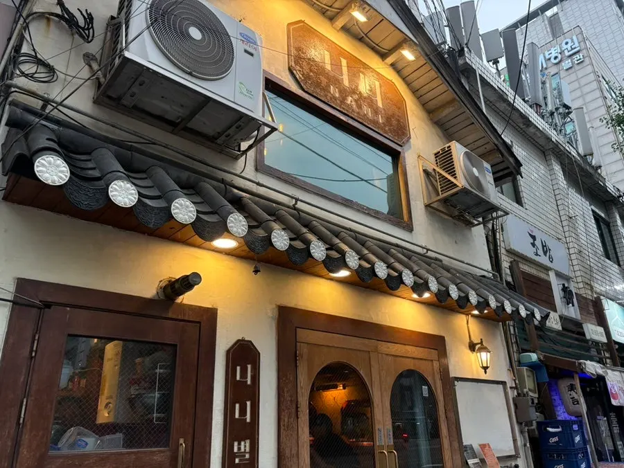 Izakaya exterior with Japanese-style signage