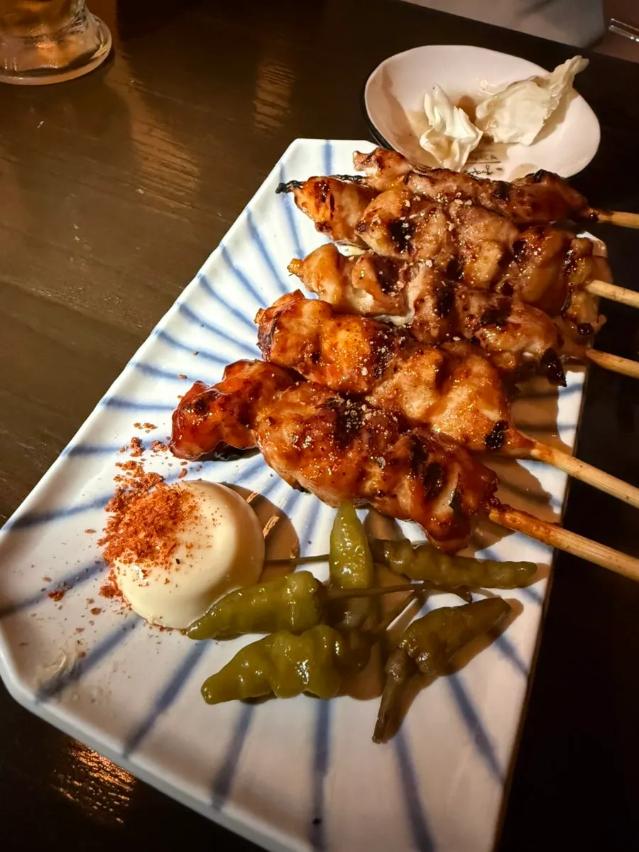 Side dishes and a beer glass on the table