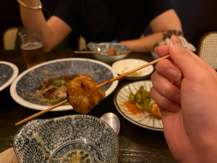 Beef intestine skewers served with spicy peppers