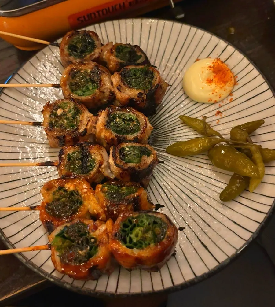 Pork belly scallion skewers served as a set of six