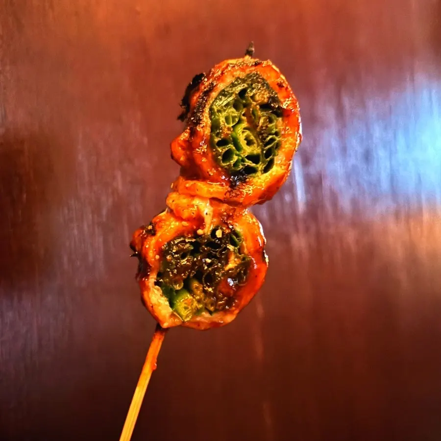 Cross-section of a skewer showing thick pork belly