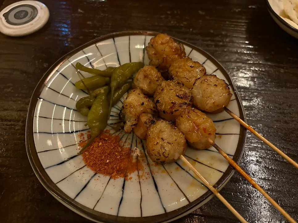 Grilled beef intestine skewers served hot