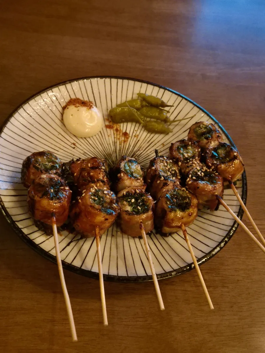 Skewers and lemon cream shrimp set on the table
