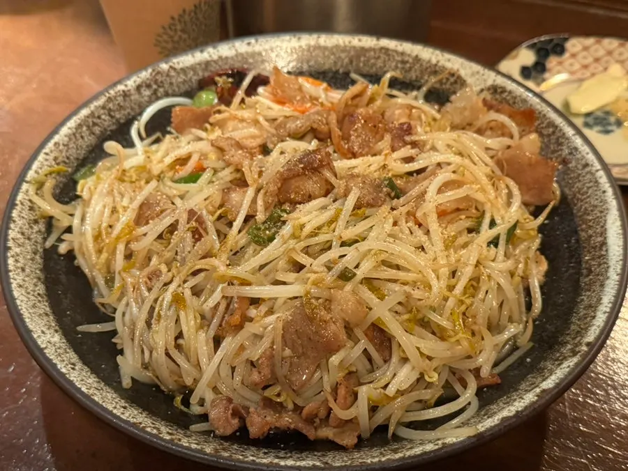 Pork and bean sprout stir-fry served first