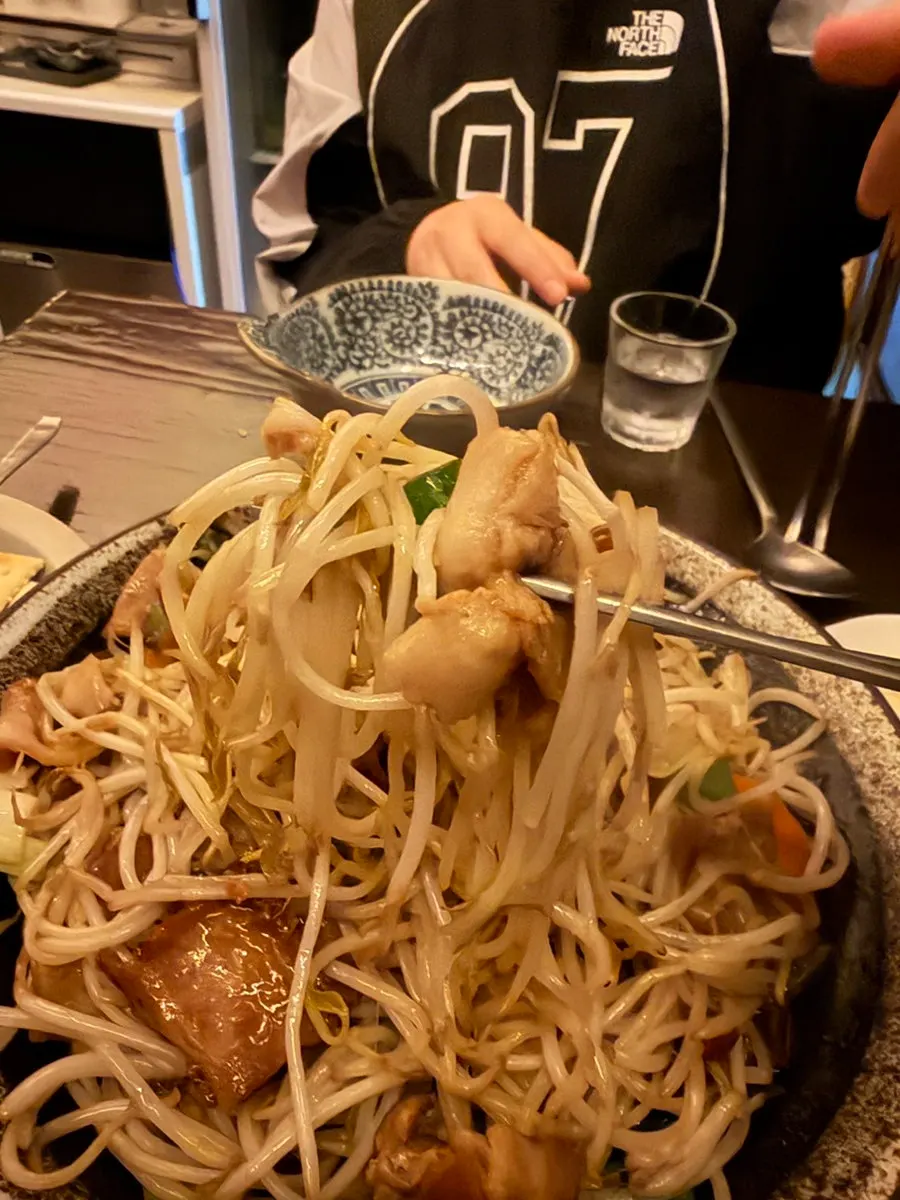 Generous plate of pork and bean sprout stir-fry