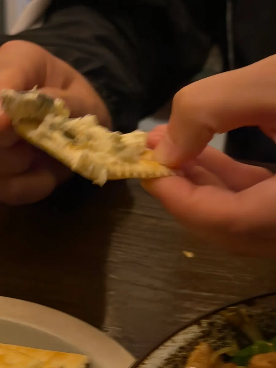 Side dish of scallion cream cheese and crackers