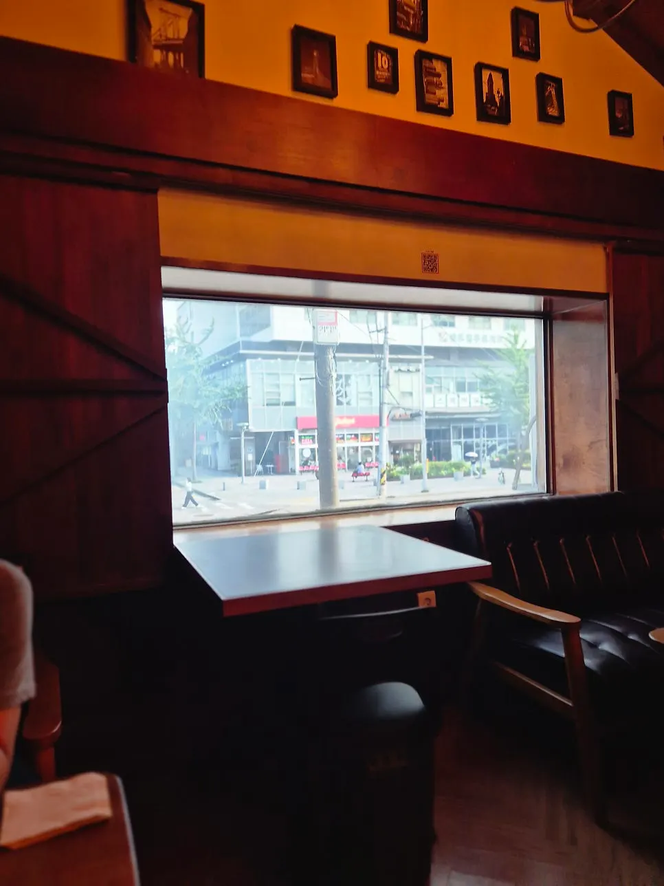 Cozy second-floor seating with soft lighting at Nani Byeolgwan